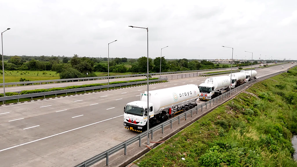 LNG tankers moving along a highway